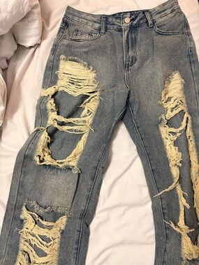 Distressed Light Blue Ripped Women’s Jeans